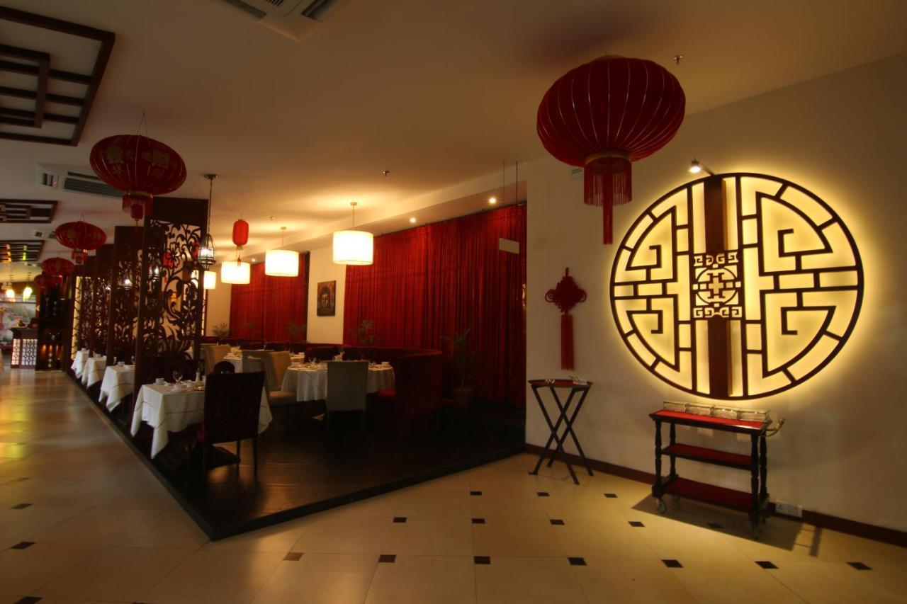 Ramada Plaza By Wyndham Karachi Airport Hotel Dış mekan fotoğraf Interior of a restaurant in Beijing